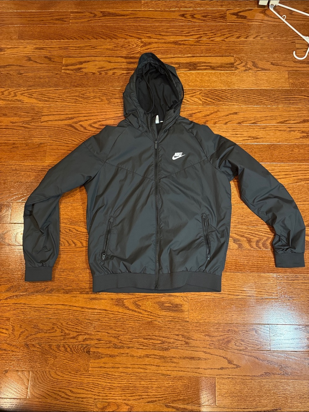 Nike Black Hooded Windbreaker with White Swoosh